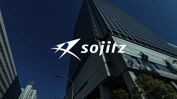 輸入車事業を展開する双日株式会社のロゴと近代的なビル外観
